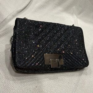 Stuart Weitzman Metallic Evening Bag gently used silver tone hardware very clean